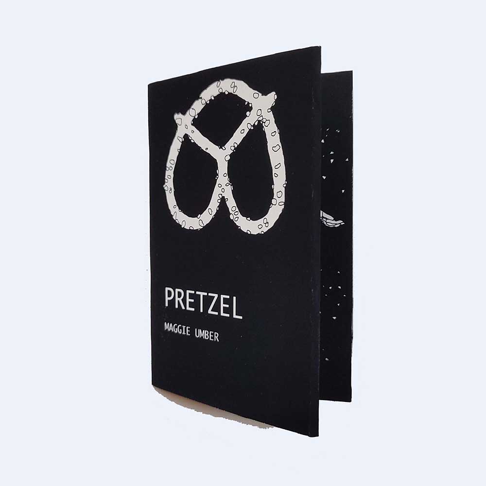 a white pretzel on a black zine cover, text reads: PRETZEL, Maggie Umber