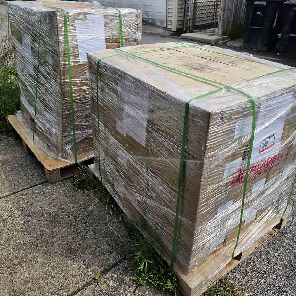 two pallets of Chrysanthemum Under the Waves graphic novels arrive